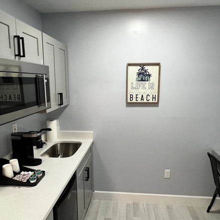 Kitchenette with microwave, coffee maker and toaster