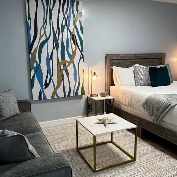 Queen size bed with Memory Foam mattress for rejuvenating rest. Premium comfort and heirloom-style quality bed sheets.
Fluffy and cozy sofa that can be open to a queen size bed if needed.
